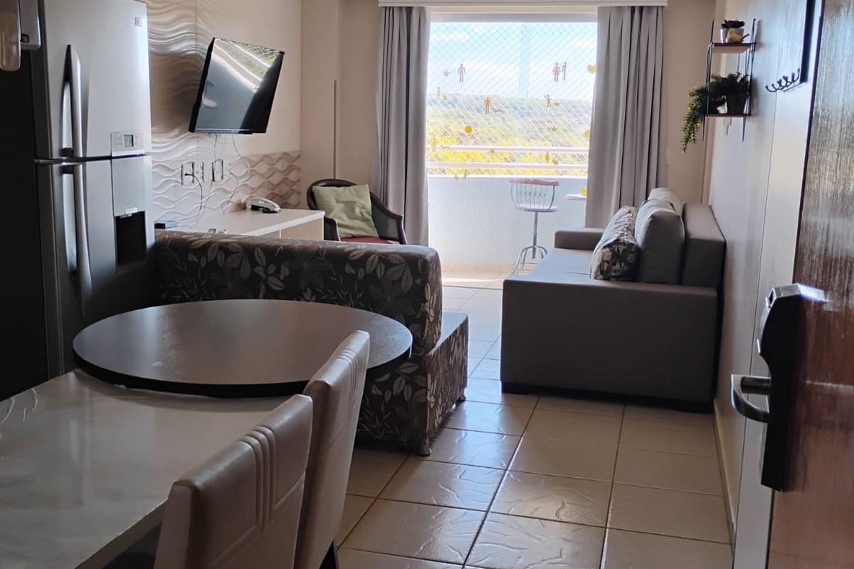 Sala de estar e cozinha do apartamento 722-B